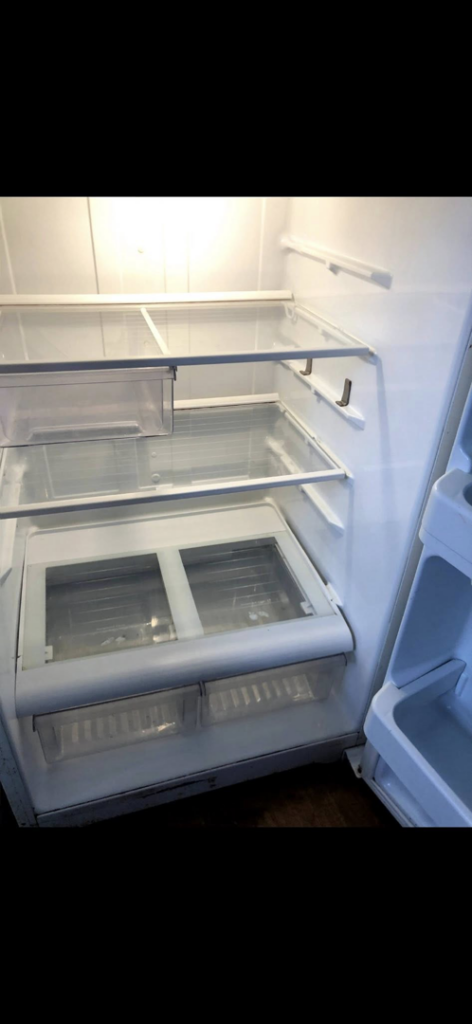 A spotless and thoroughly cleaned refrigerator interior, a result of professional house cleaning by Elizabeth's cleaning in Cedar Park, TX.