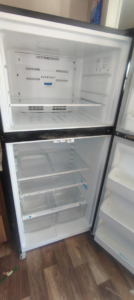 A spotless and thoroughly cleaned refrigerator interior by Last Chance cleaning service in Dothan, AL.