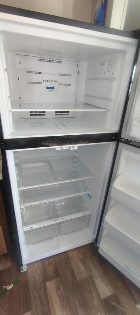 A spotless and thoroughly cleaned refrigerator interior by Last Chance cleaning service in Dothan, AL.