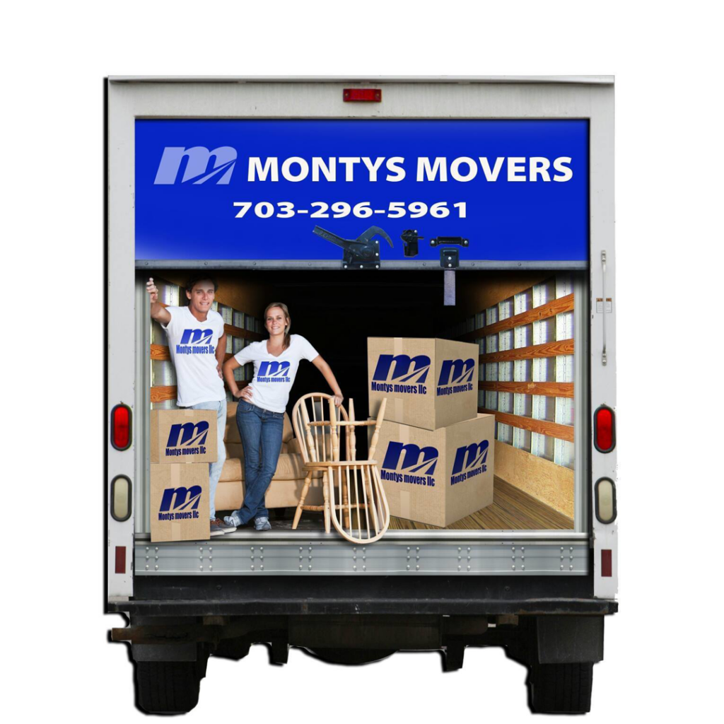 Stacked moving boxes with the company logo in an empty room, ready for a move by Monty's Movers in Fairfax, VA.