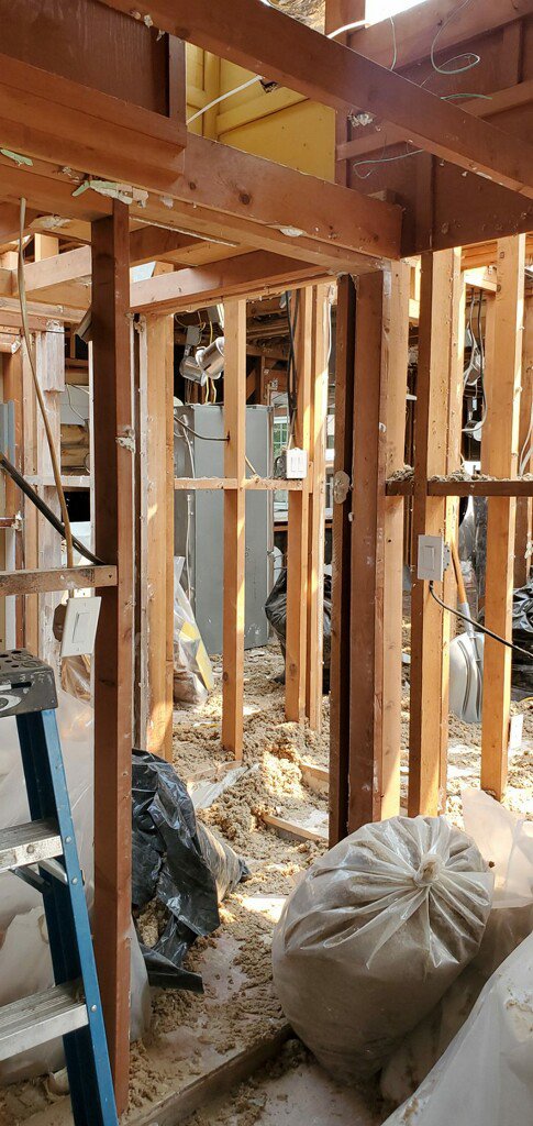A room undergoing structural drying and debris removal during water damage restoration by Bordi Restoration in San Leandro, CA