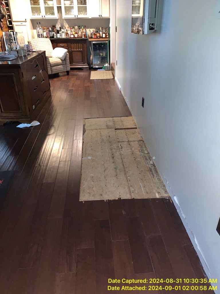 Removed floorboards exposing the subfloor during water damage repair by Prime Restoration in Lancaster, PA.