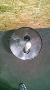 A top-down view of a sump pump basin, a key component for crawlspace water management by Allied Foundation & Crawlspace Solutions in Decatur, AL.