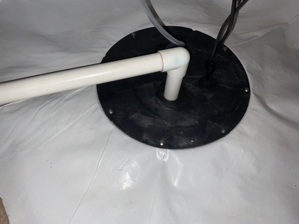 A sump pump installed in a fully encapsulated crawl space by Wetlock Waterproofing in Rock Hill, SC.