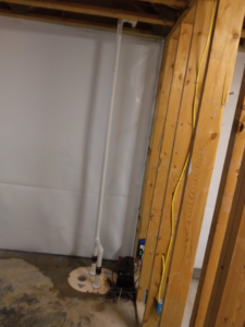A newly installed sump pump system in a crawlspace for effective water damage prevention by Allied Foundation & Crawlspace Solutions in Decatur, AL.