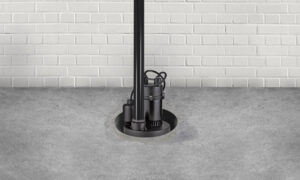 Sump pump installation for water damage prevention by Clog Busterz Plumbing Services in Richmond, KY.