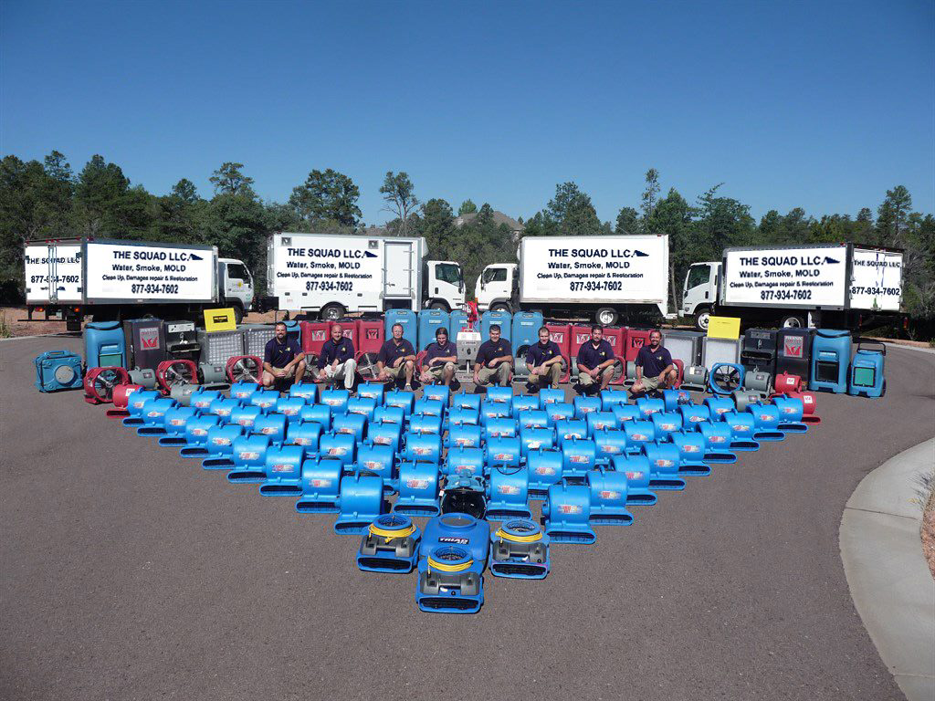 The Water Damage Squad team with their full fleet of trucks and water damage restoration equipment in Philadelphia, PA.
