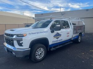 The branded service truck for The Door Man - Garage Doors & Openers, ready for jobs in Reno, NV
