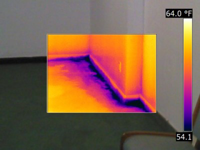 Thermal imaging showing water damage detection in a corner at a property serviced by AllStar Response in Manhattan, KS