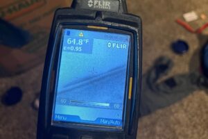 A thermal scan being performed to detect hidden water damage by Minneapolis Water Damage Specialist 24/7 in Minneapolis, MN.