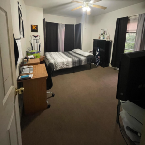 A tidy and organized bedroom after professional cleaning by Lourdes Home Cleaning in East Hampton, NY.