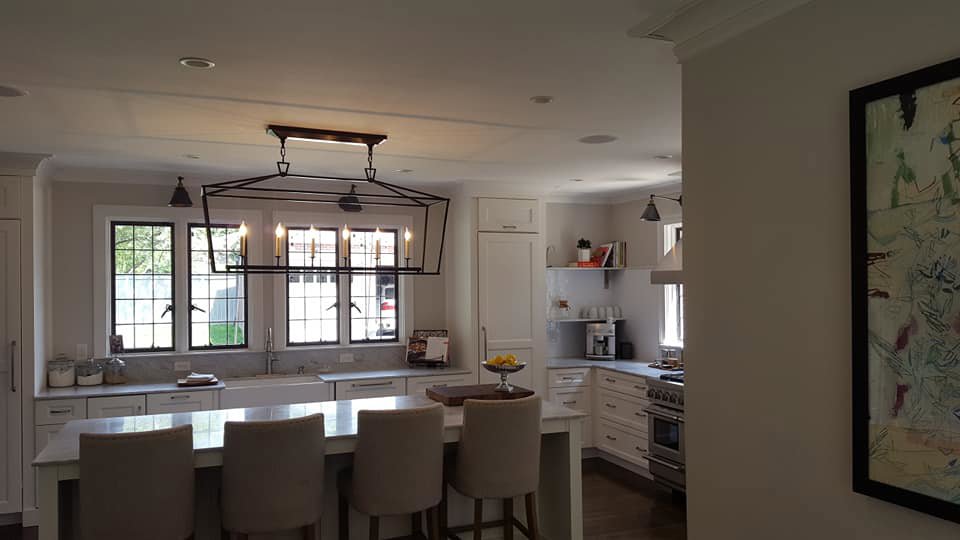 A tidy kitchen with an island and seating, reflecting the excellent cleaning service from Jessie Clean in Indianapolis, IN.