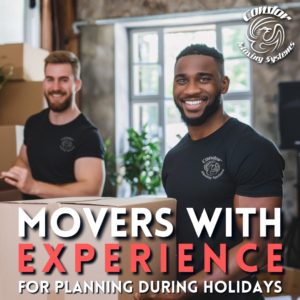 Two professional movers from Condor Moving Systems, one holding a box, in Arlington, TX.