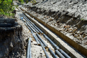Underground water pipe repair work by Clog Busterz Plumbing Services in Richmond, KY.