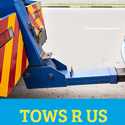 A vehicle being safely towed by a professional tow truck from Tows R Us in Scottsdale, AZ.