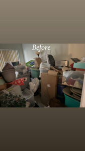 A very cluttered room filled with boxes and items, indicating a need for cleaning by The Blake Experience Cleaning Service in Albany, NY.