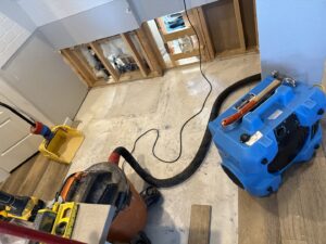 Water damage cleanup and drying equipment in use in a residential home by APEX Restoration in Mililani, HI