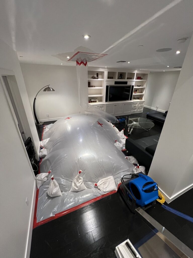 Large containment drying system and air mover for water damage restoration by Built Different Restoration in Gilbert, AZ.