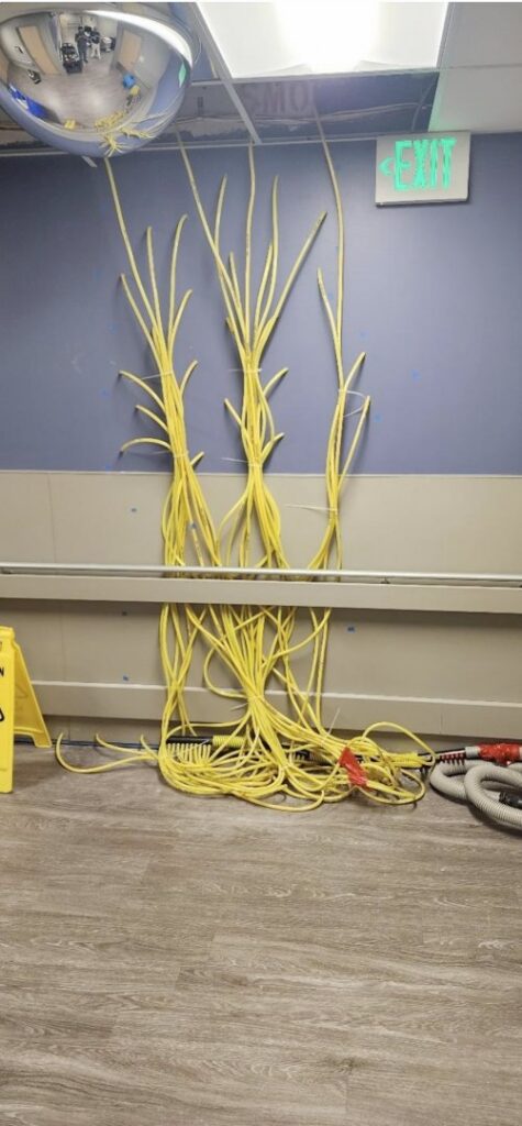 Water damage drying equipment, including air movers and bundled extension cords, used by SO-CO Water Damage in Pueblo, CO.