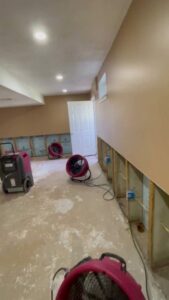 Water damage drying equipment and removed drywall in a basement by PuroClean of Lancaster in Lancaster, PA.