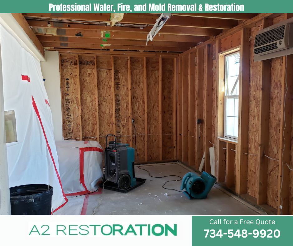 Drying equipment, including a dehumidifier and air mover, used for water damage restoration by A2 Restoration in Ann Arbor, MI.