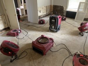 Water damage drying equipment, including air movers and dehumidifiers, set up by PuroClean of Lancaster in Lancaster, PA.
