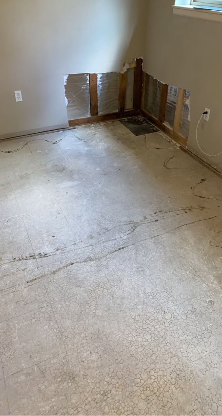 Drywall removed from a room to address water damage and mold, by Quality Remediation llc in Everett, WA