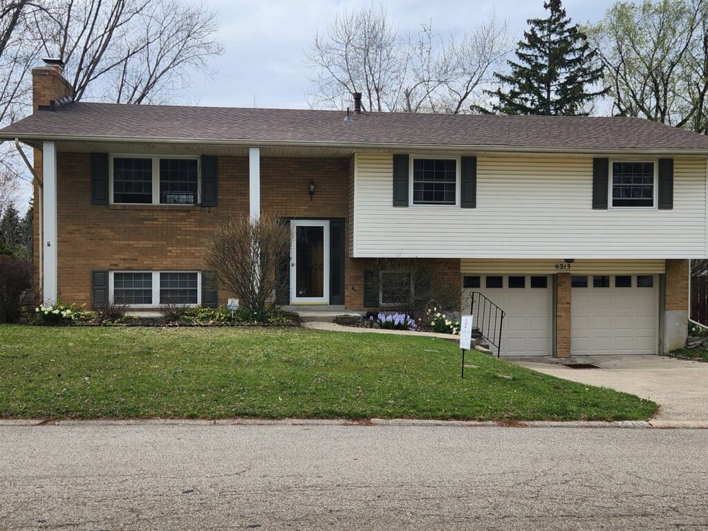 Specialized equipment, including a large fan and dehumidifier, is actively drying a water-damaged area by Johnson Restoration in Centerville, OH.