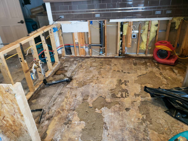 A kitchen undergoing water damage restoration with drying equipment by Certified Professional Restoration in Simpsonville, SC.