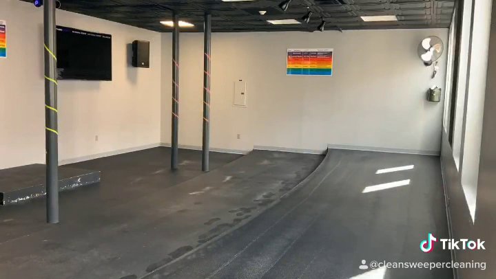 A wet gym floor after professional cleaning by Clean Sweeper Cleaning Services in Melrose, MA