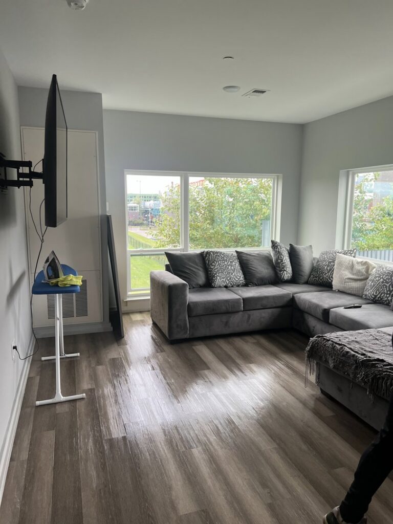 A wet kitchen floor after cleaning, showing the thorough work of Statewide cleaning services llc in Philadelphia, PA.