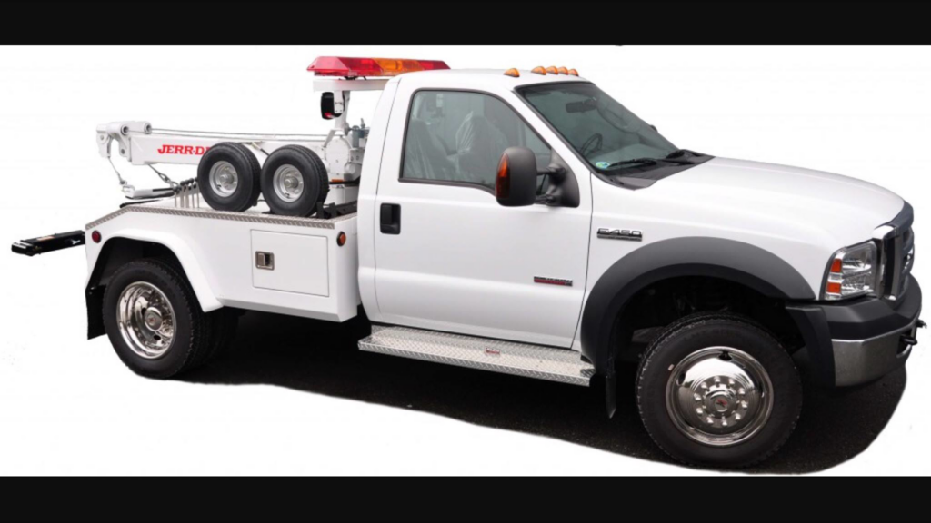 A white wrecker tow truck available for emergency towing from St Pete Towing Services in Saint Petersburg, FL.