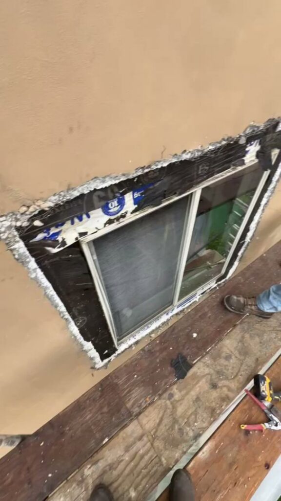 Window flashing and exterior wall preparation during a siding project by Good Life Construction Inc in North Highlands, CA